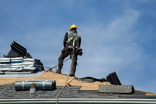 Professional Roofing technician working in Roxbury, CT